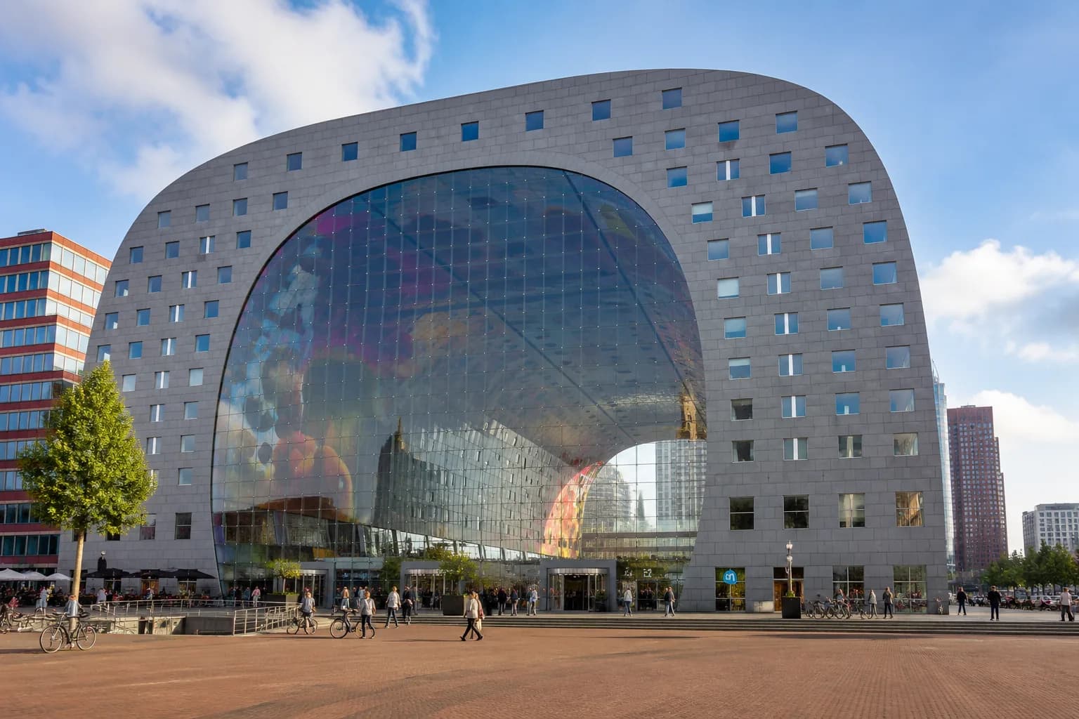 Exterior of Markthal Rotterdam with its iconic arched glass facade and city plaza